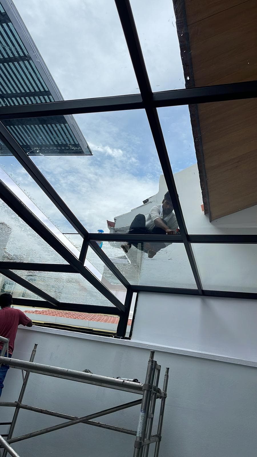 Before and after silicone seal replacement on a patio canopy